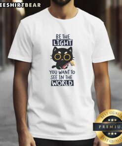 Funny cat graphic on a Be The Light You Want To See In The World T-shirt, perfect for cat lovers and positive vibes.