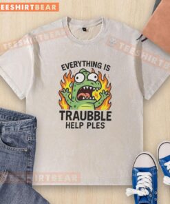 Alt Text: Funny everything is trouble help please washed t-shirt design with playful text and vibrant colors.