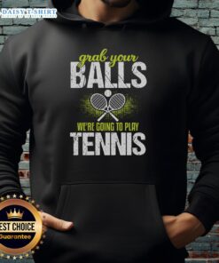 Funny hoodie with Grab Your Balls, We're Going to Play Tennis slogan, perfect for tennis enthusiasts and humor lovers.