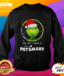 Alt Text: Funny Grinch Christmas sweatshirt with 'I Used to Smile and Then I Worked at PetSmart' text, perfect for holiday humor.