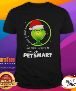 Funny Grinch Christmas t-shirt featuring 'I Used To Smile And Then I Worked At Petsmart' text design for pet lovers.