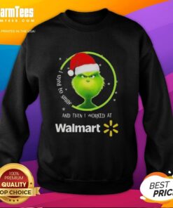 Funny Grinch Christmas sweatshirt with text 'I Used To Smile And Then I Worked At Walmart' perfect for holiday humor.
