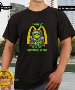 Funny Grinch Christmas Tree X McDonald's T-shirt featuring 'I Work At It's Fine Everything Is Fine' slogan.