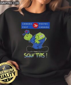 Funny Grinch X Canada Postes sweatshirt featuring a humorous design, perfect for holiday cheer and gift giving.