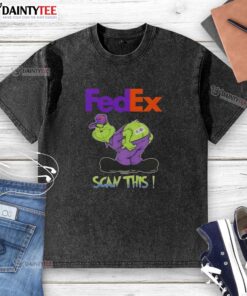 Funny Grinch X FedEx t-shirt featuring a whimsical design with 'Scan This Ass' slogan for holiday humor.