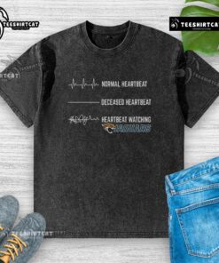 Alt Text: Funny heartbeat design on a washed Jacksonville Jaguars t-shirt, perfect for fans showing team spirit and humor.