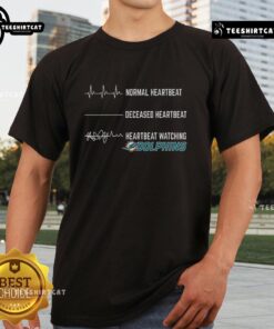 Funny Heartbeat Watching Miami Dolphins T-Shirt featuring a playful heartbeat graphic and vibrant team colors.