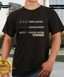 Funny heartbeat graphic on a Minnesota Vikings T-shirt, perfect for fans showing team spirit and humor.