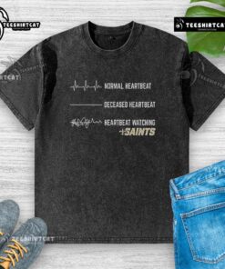 Alt Text: Funny Heartbeat design on a washed t-shirt for New Orleans Saints fans, showcasing team spirit and humor.