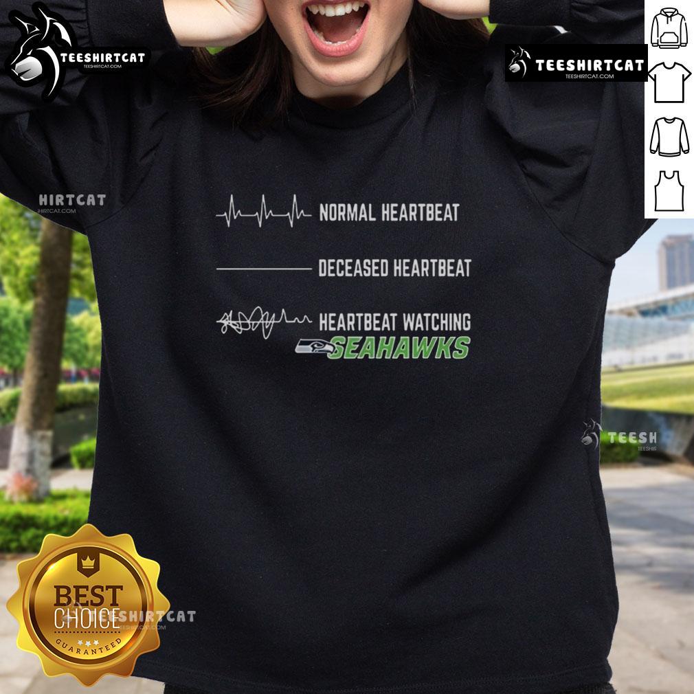 Funny Heartbeat Watching Seattle Seahawks Sweatshirt Funny heartbeat design on a Seattle Seahawks sweatshirt, perfect for fans showcasing team spirit and humor.