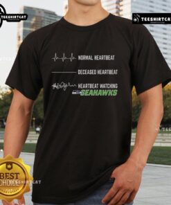 Funny Heartbeat Watching Seattle Seahawks T-Shirt featuring a playful heartbeat graphic and team colors for fans.