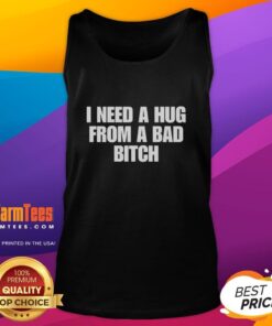 Funny 'I Need A Hug From A Bad Bitch' tank top design showcasing humor and style for trendy fashion lovers.