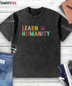 Funny learn humanity icon on a smiley face graphic printed on a washed t-shirt, perfect for casual wear.