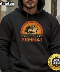 Funny Merry Fishmas hoodie featuring a retro sunset design perfect for fishing enthusiasts celebrating Christmas.