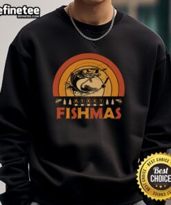 Funny Merry Fishmas sweatshirt featuring retro sunset design, perfect for Christmas fishing enthusiasts.