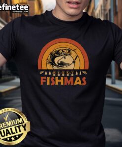 Funny Merry Fishmas Christmas T-Shirt featuring a retro sunset and fishing theme, perfect for anglers celebrating the holidays.