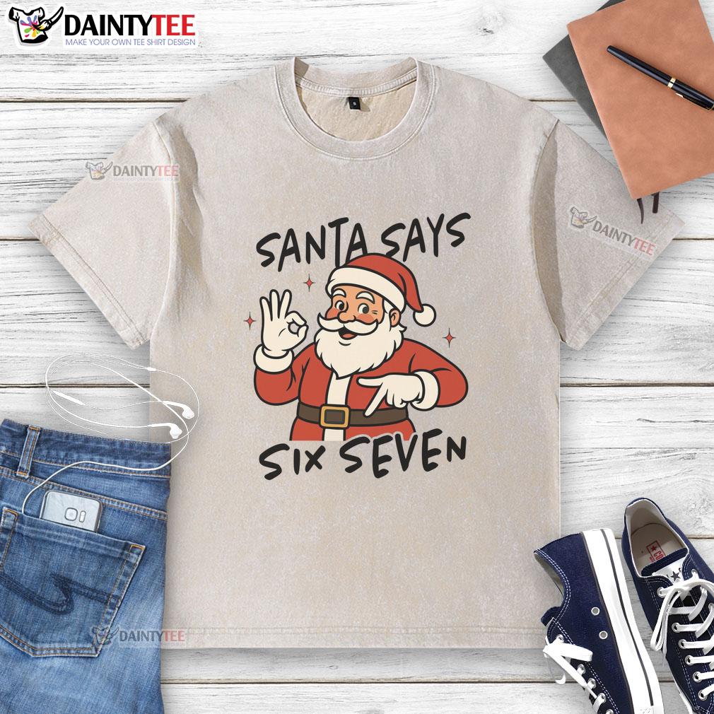 funny-santa-says-six-seven-67-christmas-washed-t-shirt Alt Text: Funny Santa graphic t-shirt featuring Santa Says Six Seven 67 design, perfect for Christmas celebrations.