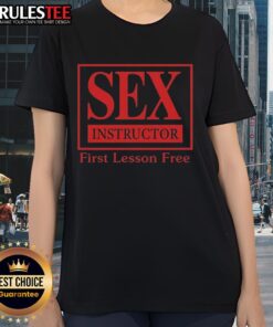 Funny sex instructor graphic on a ladies' tee, promoting a lighthearted first lesson free concept.