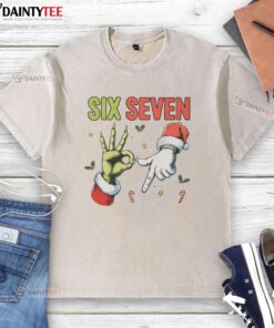 Funny Christmas meme on a washed t-shirt featuring the numbers 6 and 7, perfect for holiday humor and festive vibes.