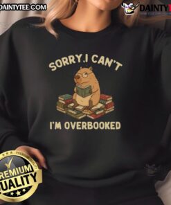 Funny 'Sorry, I Can't, I'm Overbooked' Capybara Sweatshirt design featuring a cute capybara graphic for casual wear.