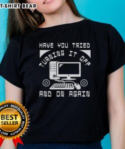Funny tech support t-shirt featuring 'Have you tried turning it off and on again?' for tech enthusiasts and humor lovers.