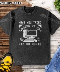 Funny tech support t-shirt featuring the phrase 'Have you tried turning it off and on again?' in playful typography.