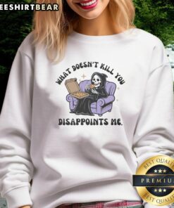 Alt Text: Funny The Reaper sweatshirt featuring 'What Doesn't Kill You Disappoints Me' quote, perfect for humor lovers.