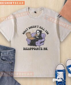 Alt Text: Funny The Reaper What Doesn't Kill You Disappoints Me washed t-shirt, featuring a humorous skull design perfect for casual wear.