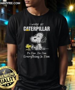 Alt Text: Funny Tired Snoopy graphic on a I Work At Caterpillar It's Fine I'm Fine Everything Is Fine T-shirt.