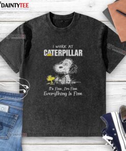 Funny Snoopy graphic on a washed t-shirt saying 'I work at Caterpillar, it's fine, I'm fine, everything is fine'.