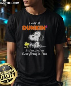 Alt Text: Funny Tired Snoopy graphic on a t-shirt with 'I Work At Dunkin It'S Fine I'M Fine Everything Is Fine' quote.