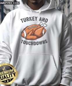 Funny turkey and touchdowns design on a cozy Thanksgiving football fan hoodie for holiday cheer.