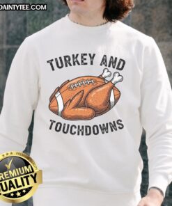 Alt Text: Funny turkey and touchdowns design on a Thanksgiving football fan sweatshirt, perfect for holiday celebrations.