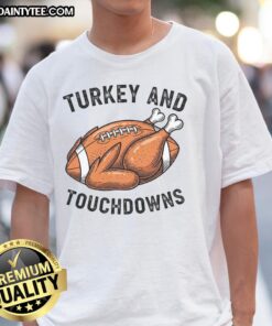Funny Turkey and Touchdowns Thanksgiving Football Fan T-Shirt featuring a playful turkey graphic and sports elements.