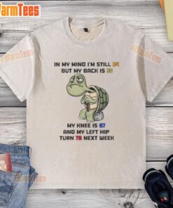 Funny turtle wearing a washed t-shirt, humorously reflecting on aging with I'm still 24, but my back is 55 text.