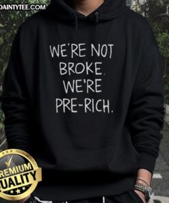 Alt Text: Funny 'We're Not Broke, We're Pre-Rich' hoodie design featuring playful text in bold colors on a cozy sweatshirt.