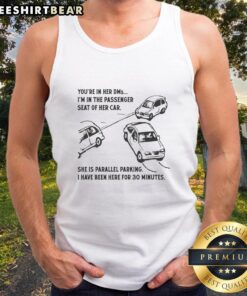 Funny meme of a guy in a tank top humorously saying 'You're in her DMs, I'm in the passenger seat' during parallel parking.