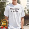 Good Brooklyn Wearing Warning I Bite T-Shirt, showcasing a stylish graphic tee with a playful warning message.