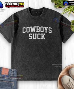 Fan wearing 'Cowboys Suck' washed t-shirt at Good Chiefs vs Lions game, showcasing team spirit and rivalry.