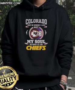 Person wearing a Kansas City Chiefs hoodie, showcasing pride for the team in Colorado, blending local and sports loyalty.
