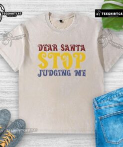 Good Dear Santa Stop Judging Me washed t-shirt featuring a humorous holiday design for festive casual wear.
