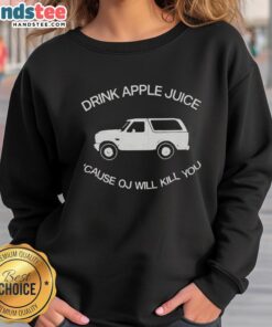 Good Drink Apple Juice Cause OJ Will Kill You sweatshirt featuring a playful graphic and bold text design.