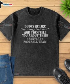Funny washed t-shirt design: 'Good Dudes Be Like Astrology Isn't Real' with fantasy football team graphic.