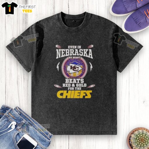 Alt Text: Kansas City Chiefs washed t-shirt in red and gold, showcasing team spirit for football fans in Nebraska.