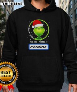 Good Grinch Christmas hoodie with 'I Used to Smile and Then I Worked at Penske Corporation' text, perfect for holiday cheer.