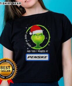 Good Grinch Christmas tee for women featuring 'I Used To Smile And Then I Worked At Penske Corporation' design.