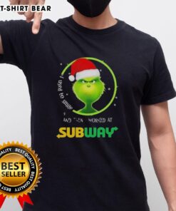 Good Grinch Christmas t-shirt featuring 'I Used To Smile And Then I Worked At Subway' graphic design for festive humor.