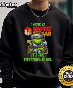 Cozy sweatshirt featuring a festive Grinch Christmas tree design, perfect for holiday cheer from Family Dollar.