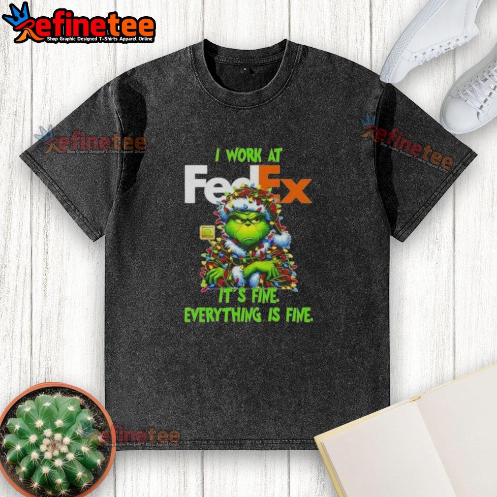 good-grinch-christmas-tree-x-fedex-i-work-at-its-fine-everything-is-fine-washed-t-shirt Alt Text: Good Grinch Christmas Tree t-shirt featuring 'I Work At Its Fine Everything Is Fine' design for a festive holiday vibe.