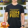 Alt Text: T-shirt featuring 'Good I Got My Human Rights Violated At The Riyadh Comedy Festival' slogan, highlighting human rights issues.